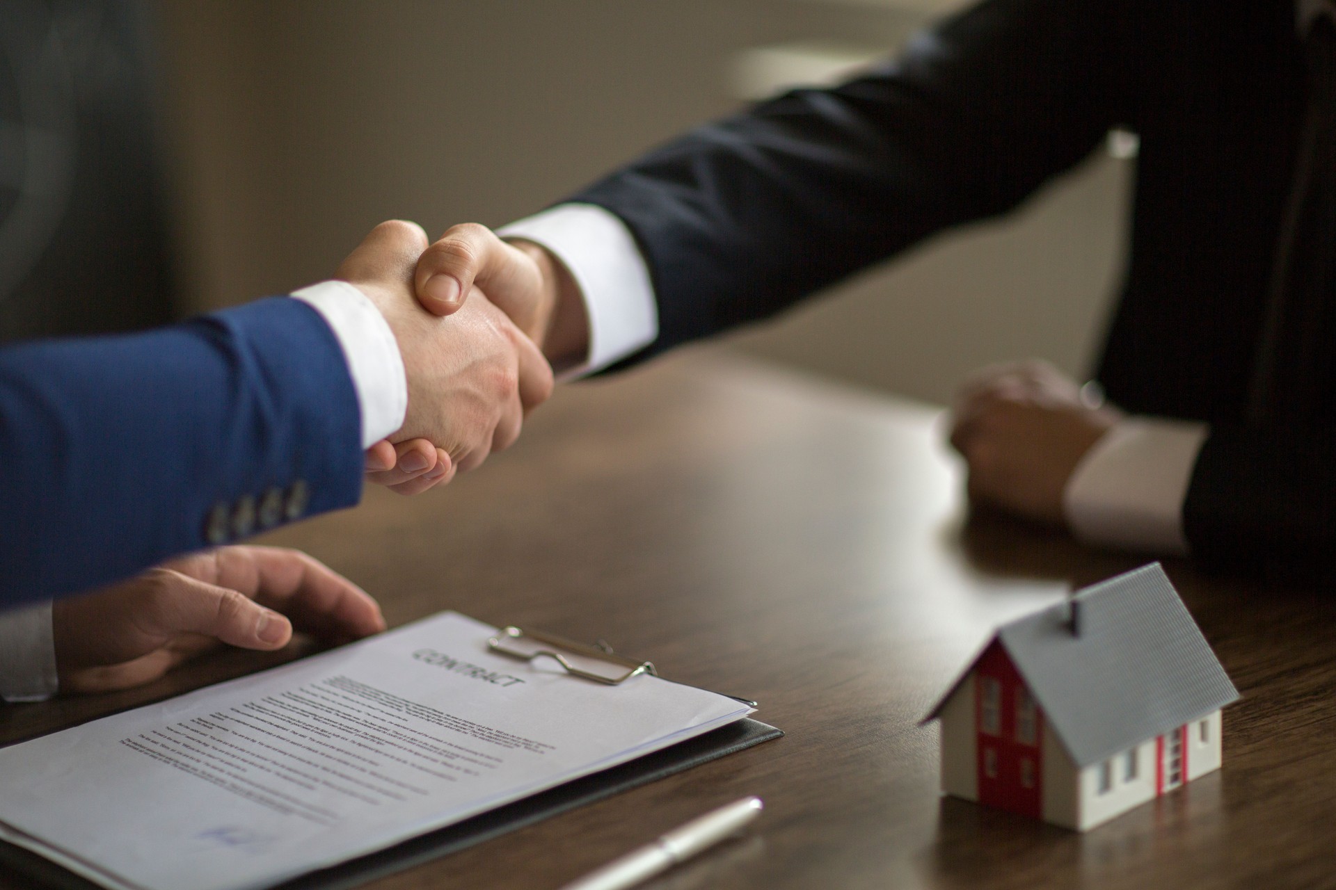 Making real estate deal, handshake with agent
